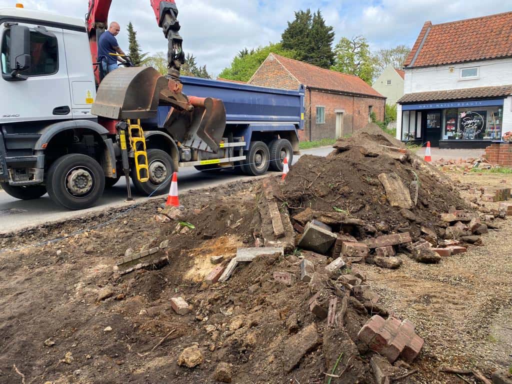 This is a photo of a dig out being carried out for the installation of a new tarmac driveway. Works being carried out by Towcester Driveways